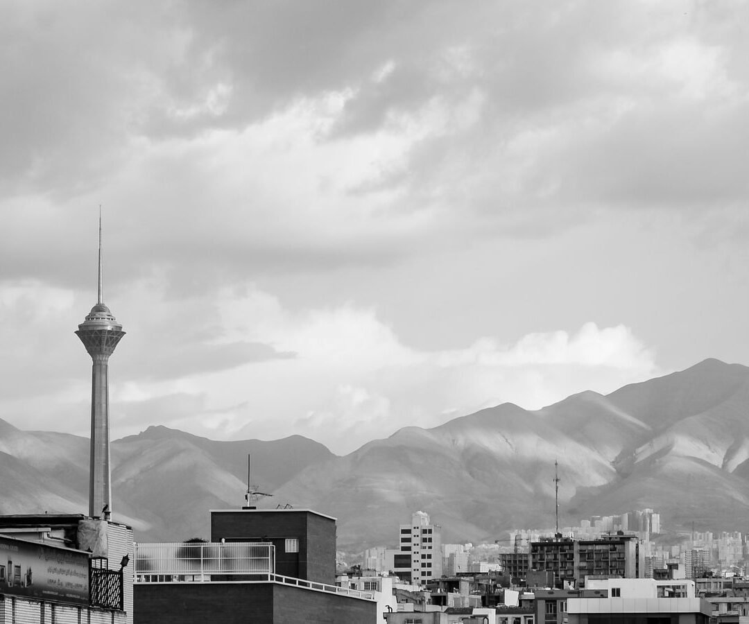 The Tehran skyline against the Alborz mountains.
